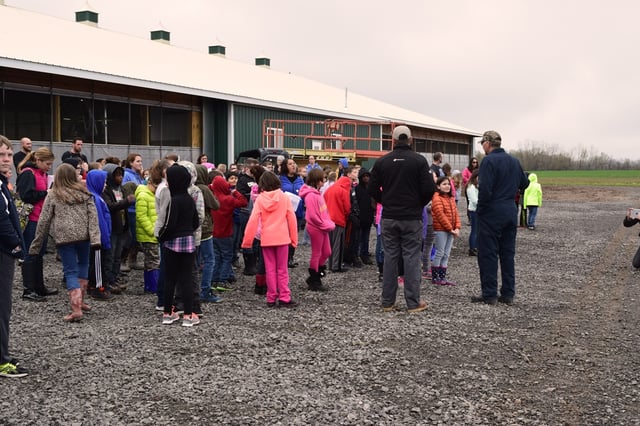 Post Farms with a group of fourth grade students learning about dairy farming and robotics. They are the future of our workforce.